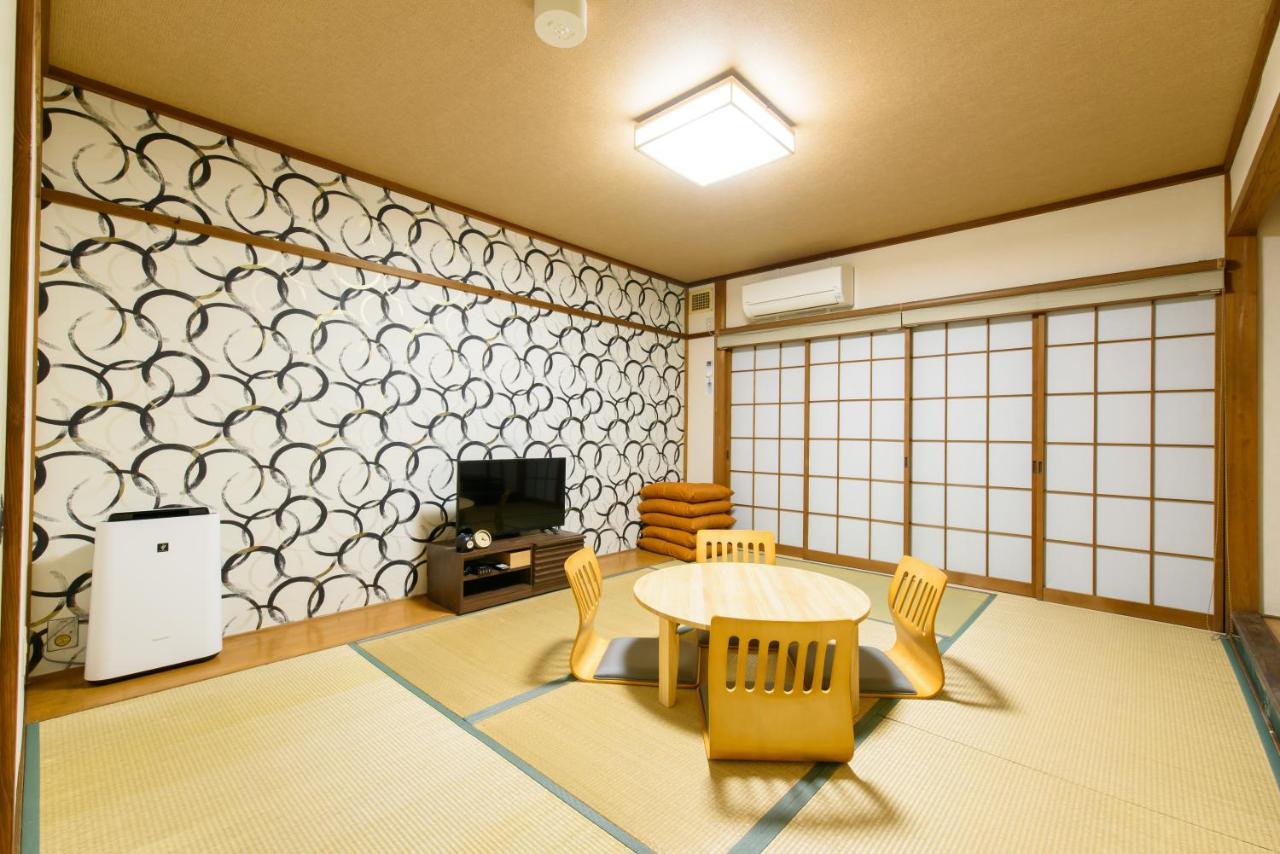 Ushiwakamaru Villa Nishinotoindori Bagian luar foto