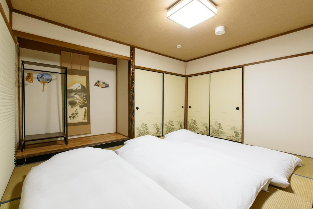 Ushiwakamaru Villa Nishinotoindori Bagian luar foto